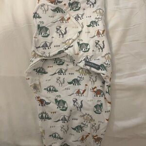 SwaddleMe Baby Sleep Sack in White with Green, Gray, Tan, and Orange Dino Print